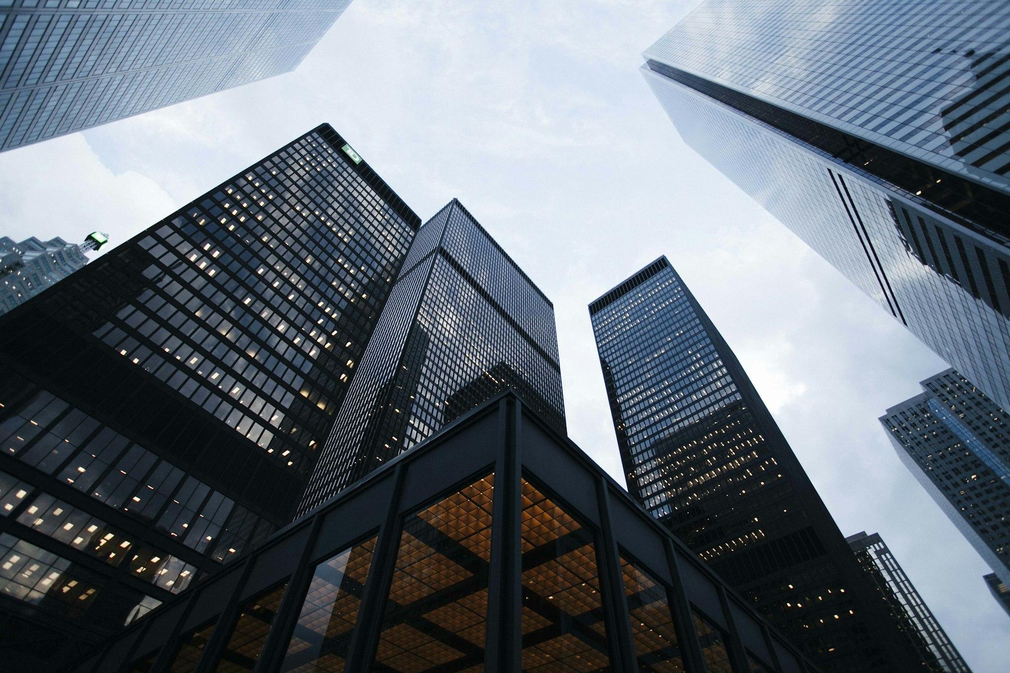 Upward view of glass corporate towers